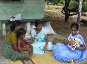 comunity nurses vising a mother and child fin their village. the nurses come from the CMC Vellore Chittoor hospital