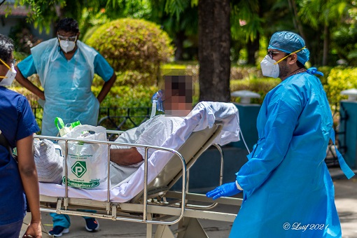 Patient being moved from the main hospital to the beds in Kannigapuram